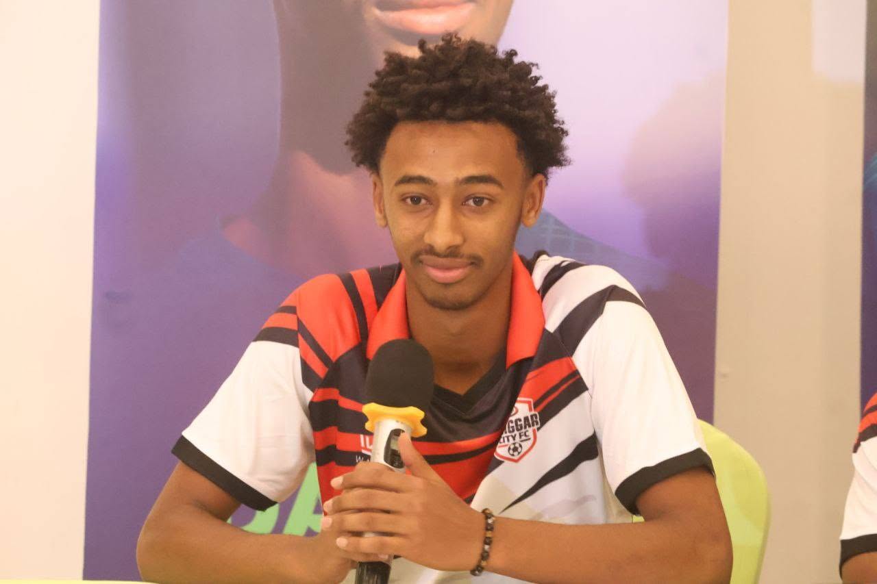 dawit speaks to the media on his signing 